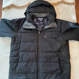 Patagonia heavy coat with attached hood.  Very warm.